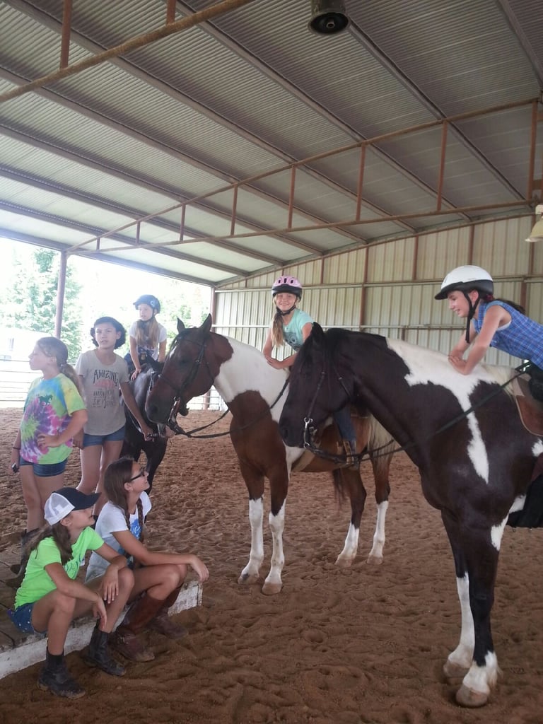 Summer horse camp group photo with instructors in Katy TX